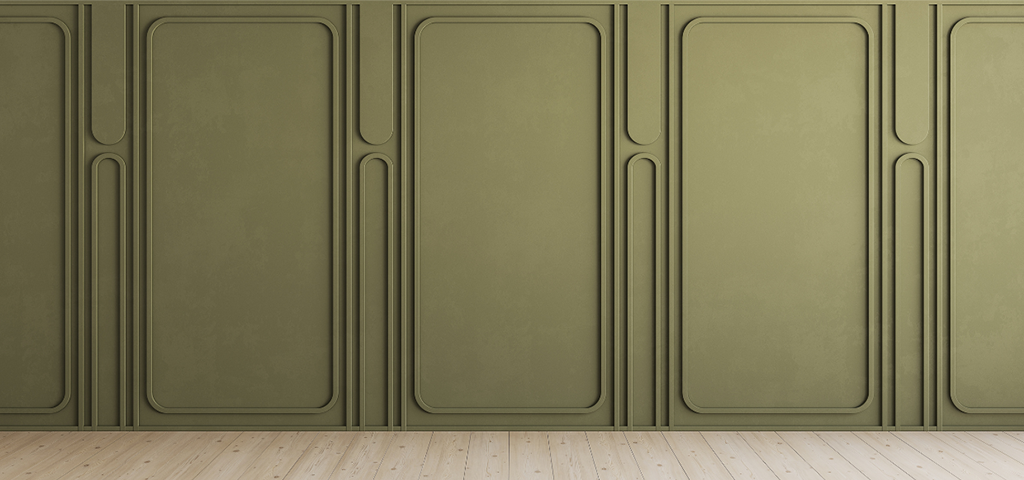 Olive green wall panels next to a wood floor