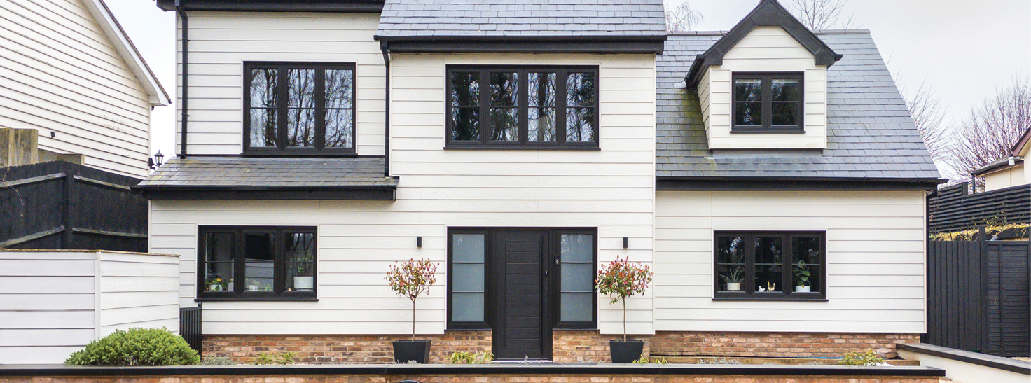 A house clad in Cladco cream fibre cement wall cladding.