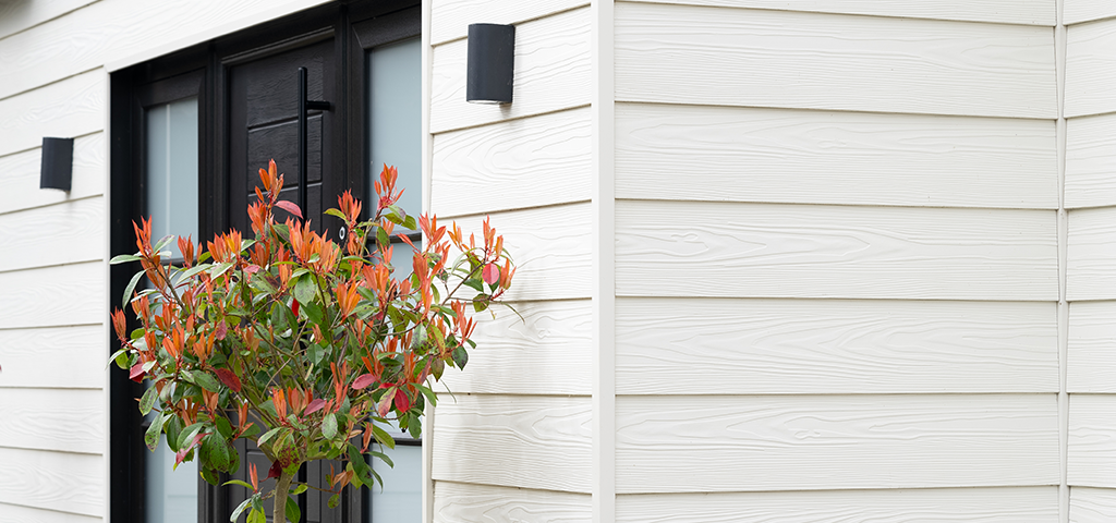 Another close up of the cladding boards next to the front door.