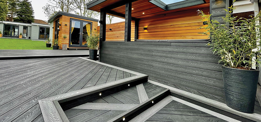 Dark-toned composite decking walkway.